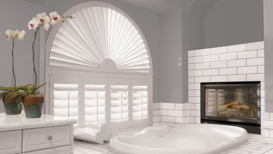 Arched windows with Plantation shutters